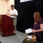 A.J. King announces the rafting award winners while Laura Welker hands out prizes.