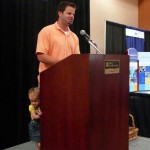 Joel Rosenberg (and daughter) announces the Golf Awards.